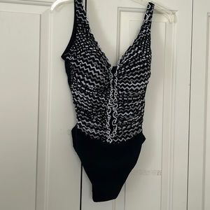 PROFILE. BATHING SUIT SIZE 12